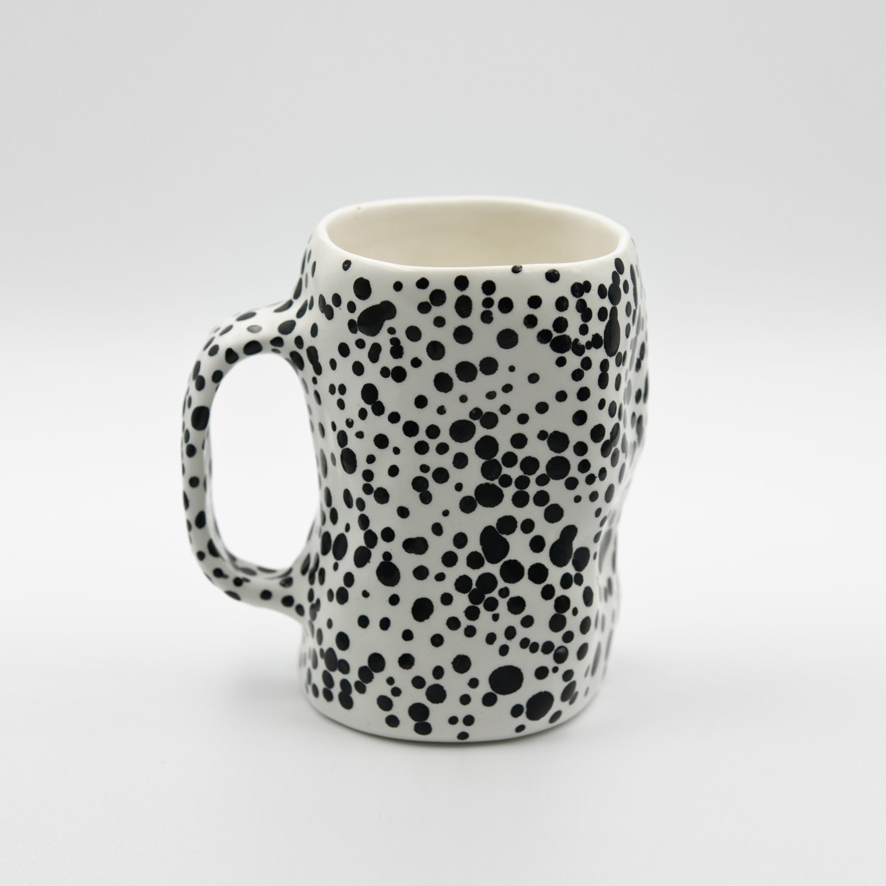 Pinched dotted mug
