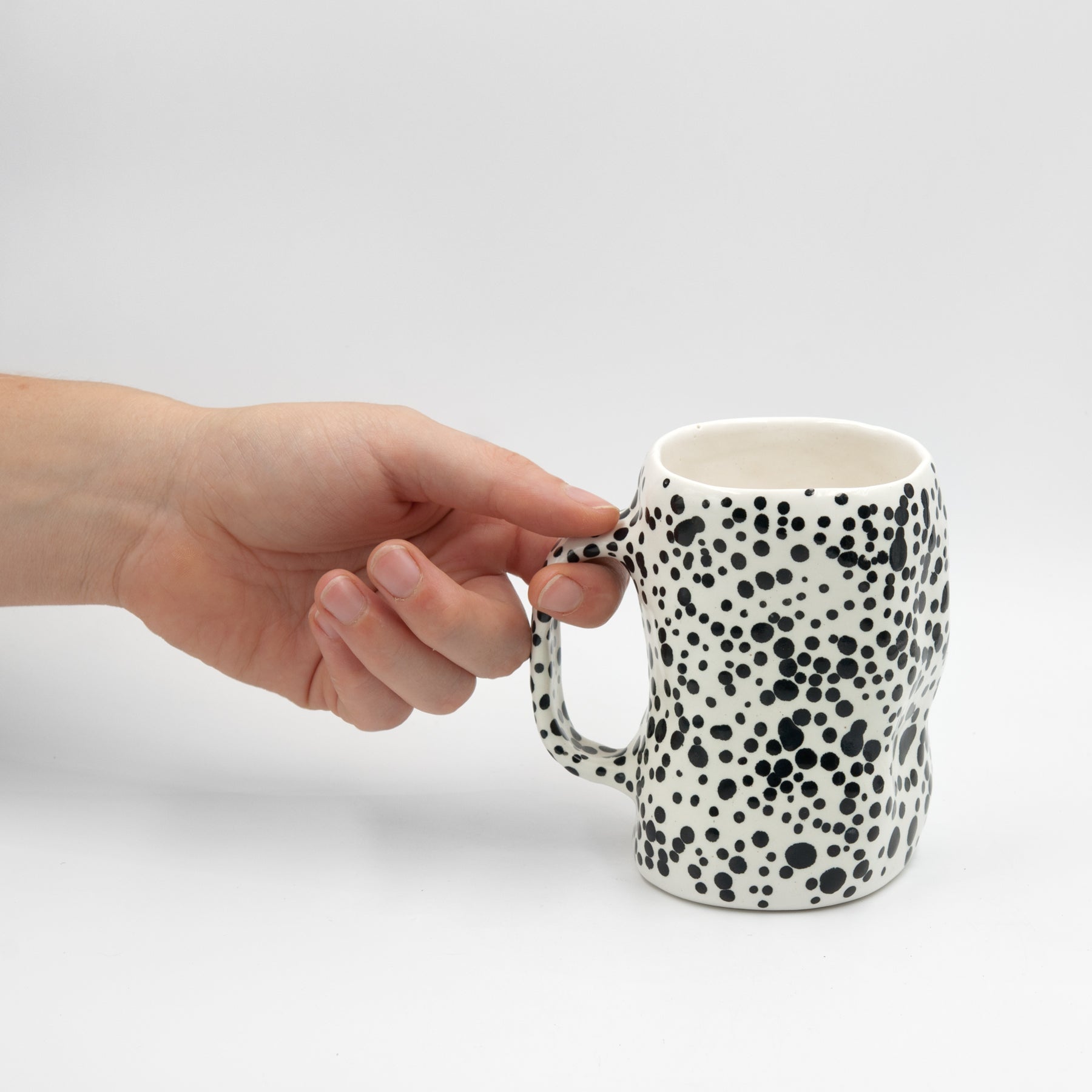 Pinched dotted mug