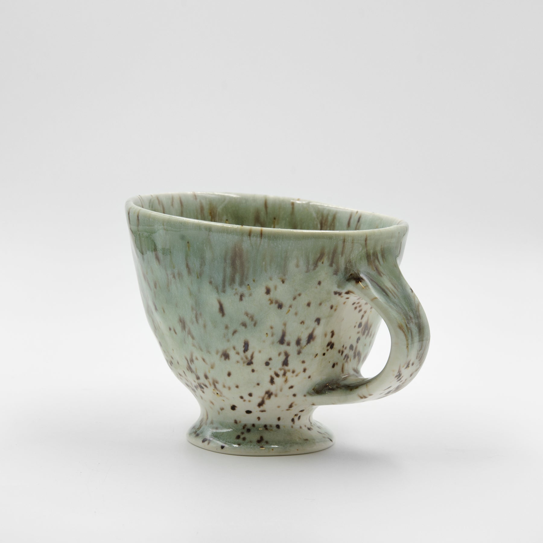 Green pinched cup