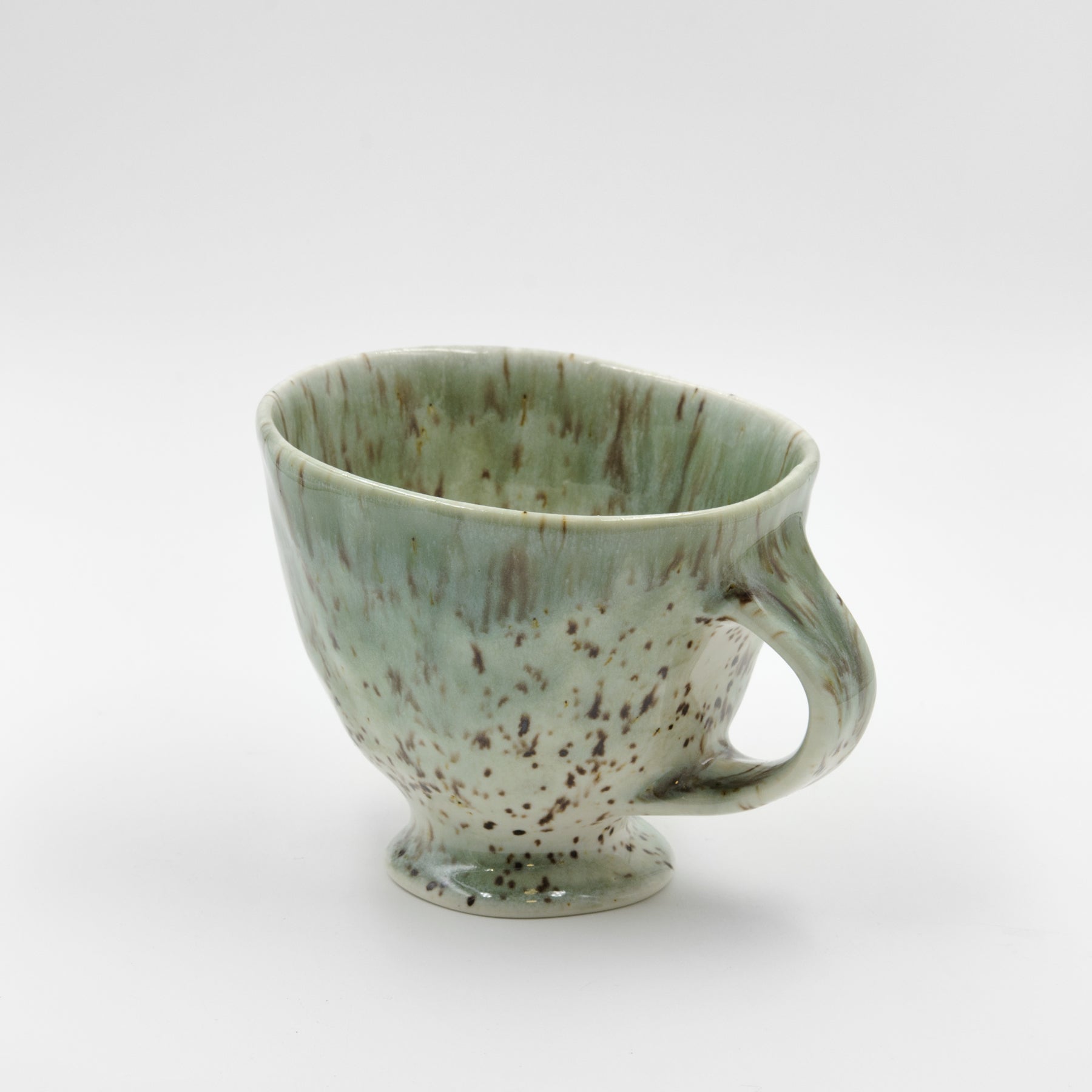 Green pinched cup